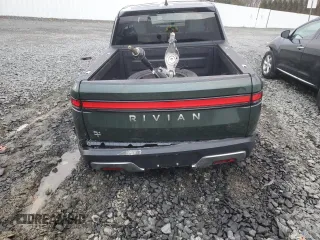 2024 Rivian R1T Adventure z VIN 7FCTGCAA1RN030829, wystawiony jako Copart lot #81459854 z przebiegiem Nie podano mil oraz Szkody całkowita. Historia ofert i sprzedaży dostępna na DreamBid. Obrazek 6.