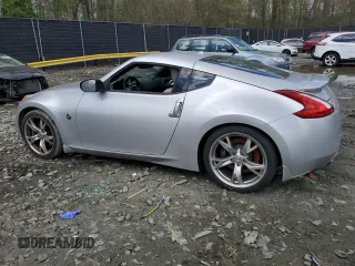 2010 Nissan 370Z with VIN JN1AZ4EH6AM505621, listed as a Copart auction lot 52745505 with 107,660 mi miles and Salvage Title. Bid and sale history available at carsss.com. Image 2.