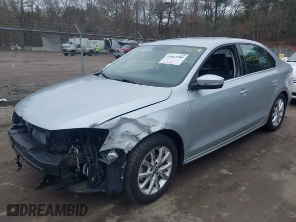 2014 Volkswagen Jetta SE with VIN 3VWD17AJ7EM331139, listed as a IAAI auction lot 41813500 with 110,233 mi miles and . Bid and sale history available at DreamBid. Image 2.