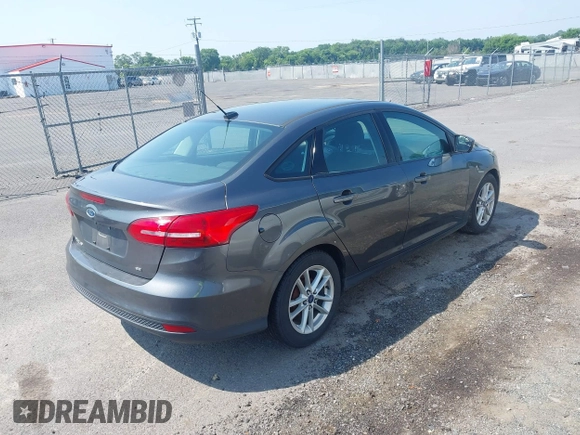 2016 Ford Focus SE with VIN 1FADP3F28GL403388, listed as a IAAI auction lot 42800054 with 190,860 mi miles and . Bid and sale history available at DreamBid. Image 4.