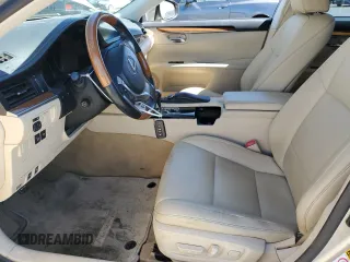 2013 Lexus ES 300h with VIN JTHBW1GG1D2011128, listed as a Copart auction lot 58246565 with 128,242 mi miles and Salvage title. Bid and sale history available at DreamBid. Image 7.