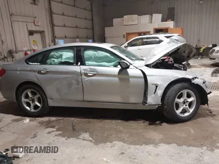 2015 BMW 4 Series 428i xDrive с VIN WBA4A7C50FD414523, выставлен на аукционе IAAI как лот 41092312 с пробегом Не указан миль и . История ставок и продаж доступна на DreamBid. Изображение 13.