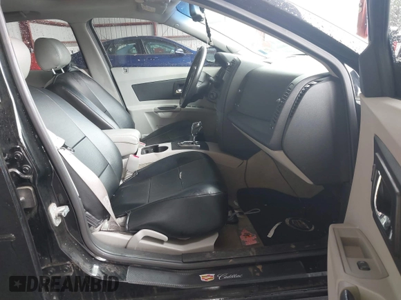 2007 Cadillac CTS z VIN 1G6DM57T870189609, wystawiony jako IAAI lot #42187184 z przebiegiem 104 189 mil mil oraz . Historia ofert i sprzedaży dostępna na DreamBid. Obrazek 5.