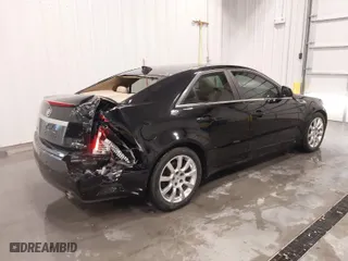 2009 Cadillac CTS AWD w/1SB with VIN 1G6DT57V490106183, listed as a IAAI auction lot 41593354 with 71,332 mi miles. Bid and sale history available at carsss.com. Image 4.