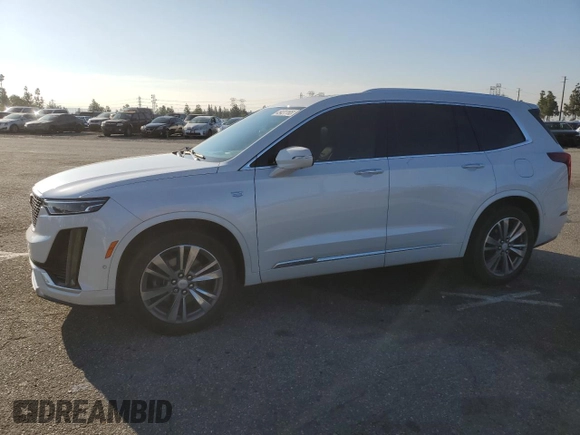 2022 Cadillac XT6 Premium Luxury with VIN 1GYKPFRS5NZ125360, listed as a Copart auction lot 45431165 with 47,511 mi miles and Salvage Title. Bid and sale history available at carsss.com. Image 1.