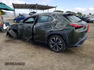 2021 Lexus UX 200 with VIN JTHX3JBH8M2036140, listed as a Copart auction lot 70534384 with 9,872 mi miles and Salvage title. Bid and sale history available at DreamBid. Image 2.