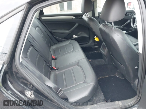 2014 Volkswagen Passat Wolfsburg Edition z VIN 1VWAT7A31EC098634, wystawiony jako IAAI lot #41924146 z przebiegiem 80 872 mil mil oraz . Historia ofert i sprzedaży dostępna na DreamBid. Obrazek 8.