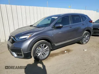 2021 Honda CR-V Touring z VIN 7FART6H94ME025290, wystawiony jako Copart lot #55838525 z przebiegiem 128 836 mil mil oraz Szkoda całkowita • Salvage title. Historia ofert i sprzedaży dostępna na DreamBid. Obrazek 1.