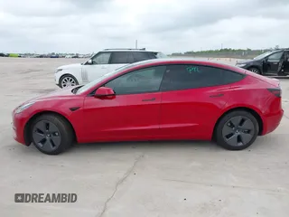 2023 Tesla Model 3 with VIN 5YJ3E1EA0PF455058, listed as a IAAI auction lot 42201618 with 31,147 mi miles and . Bid and sale history available at DreamBid. Image 13.