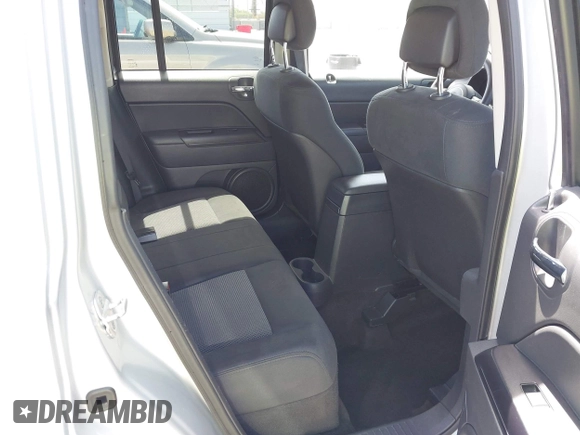 2013 Jeep Patriot Sport with VIN 1C4NJPBA7DD209591, listed as a IAAI auction lot 41945082 with 111,837 mi miles. Bid and sale history available at carsss.com. Image 8.
