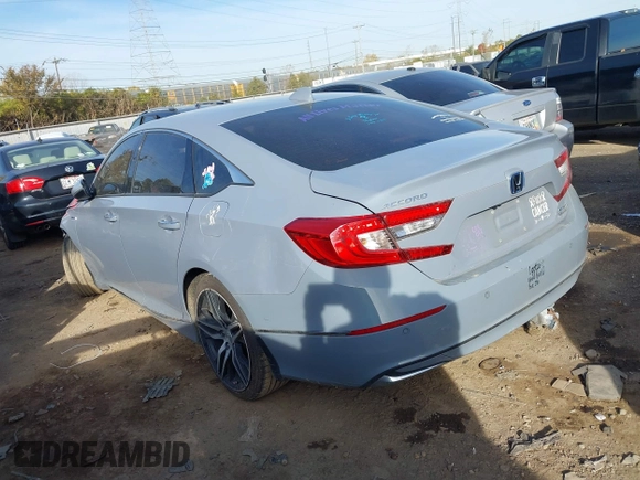 2021 Honda Accord Touring with VIN 1HGCV3F91MA002413, listed as a IAAI auction lot 40682887 with 101,653 mi miles and . Bid and sale history available at DreamBid. Image 3.