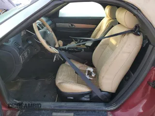 2004 Ford Thunderbird Deluxe with VIN 1FAHP60A14Y111339, listed as a Copart auction lot 77588194 with Not Provided miles and Salvage Title. Bid and sale history available at DreamBid. Image 7.