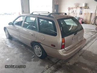 1998 Ford Escort SE with VIN 3FAFP15P6WR239732, listed as a IAAI auction lot 42093718 with 116,930 mi miles. Bid and sale history available at carsss.com. Image 3.