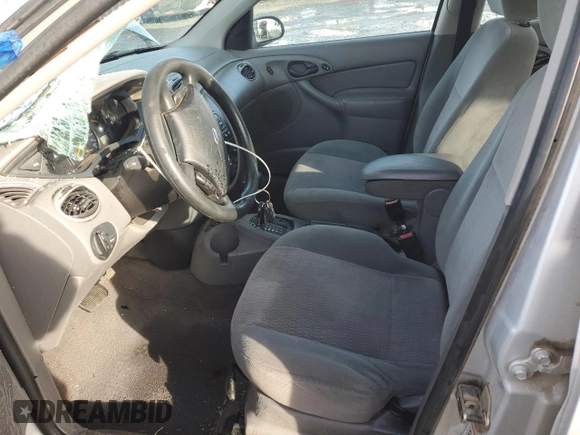 2000 Ford Focus SE Fleet с VIN 1FAHP3639YW261420, выставлен на аукционе Copart как лот 80135064 с пробегом 153 418 миль миль и Списание • Salvage title. История ставок и продаж доступна на DreamBid. Изображение 7.