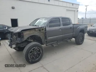 2014 Toyota Tacoma z VIN 3TMMU4FNXEM064955, wystawiony jako Copart lot #57435005 z przebiegiem 120 967 mil mil oraz Szkoda całkowita • Salvage title. Historia ofert i sprzedaży dostępna na DreamBid. Obrazek 1.