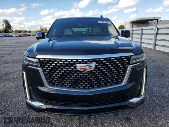 2023 Cadillac Escalade 4WD Premium Luxury z VIN 1GYS4BKL3PR236058, wystawiony jako Copart lot #46817095 z przebiegiem 53 089 mil mil oraz Tytuł czysty. Historia ofert i sprzedaży dostępna na DreamBid. Obrazek 5.