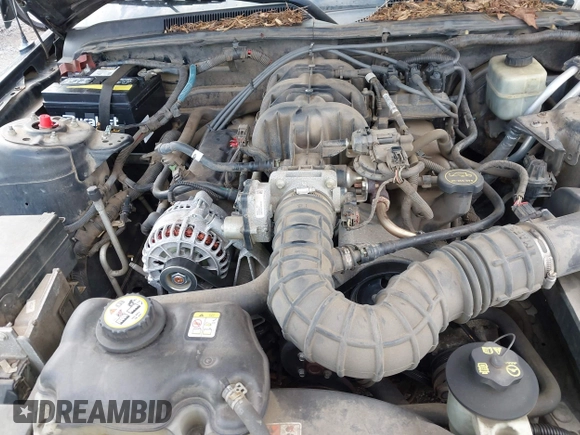 2006 Ford Mustang Standard with VIN 1ZVFT80N165264736, listed as a IAAI auction lot 41871329 with 144,304 mi miles. Bid and sale history available at carsss.com. Image 10.