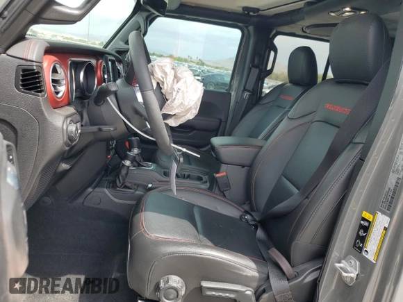 2023 Jeep Wrangler Rubicon with VIN 1C4JJXFG4PW523432, listed as a Copart auction lot 51642975 with 23,631 mi miles and Salvage title. Bid and sale history available at DreamBid. Image 7.