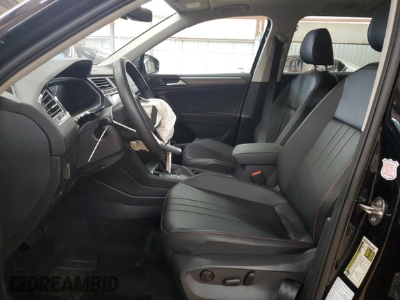 2024 Volkswagen Tiguan with VIN 3VVTB7AXXRM217272, listed as a Copart auction lot 64367425 with 8,015 mi miles and Salvage title. Bid and sale history available at DreamBid. Image 7.
