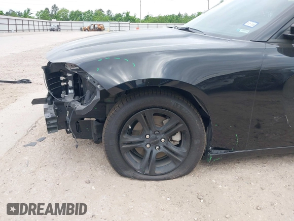 2023 Dodge Charger SXT z VIN 2C3CDXBG6PH656928, wystawiony jako IAAI lot #42027238 z przebiegiem 29 921 mil mil oraz . Historia ofert i sprzedaży dostępna na DreamBid. Obrazek 18.