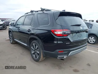 2024 Honda Pilot Touring z VIN 5FNYG1H70RB032368, wystawiony jako IAAI lot #41805758 z przebiegiem 13 078 mil mil oraz . Historia ofert i sprzedaży dostępna na DreamBid. Obrazek 3.