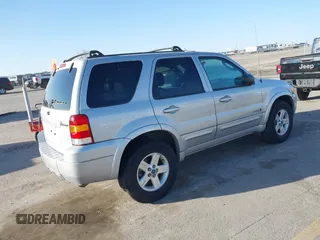 2006 Ford Escape Hybrid with VIN 1FMCU96H96KA25796, listed as a IAAI auction lot 41796914 with 119,809 mi miles and . Bid and sale history available at DreamBid. Image 4.