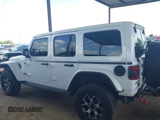 2022 Jeep Wrangler Unlimited Rubicon z VIN 1C4JJXFM6NW234295, wystawiony jako IAAI lot #41906475 z przebiegiem 47 546 mil mil oraz . Historia ofert i sprzedaży dostępna na DreamBid. Obrazek 15.