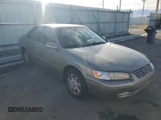 1998 Toyota Camry LE z VIN JT2BF28K2W0115564, wystawiony jako Copart lot #46628495 z przebiegiem 133 215 mil mil oraz Czysty tytuł • Clean title. Historia ofert i sprzedaży dostępna na DreamBid. Obrazek 4.