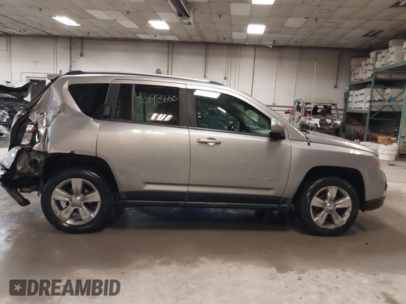 2016 Jeep Compass Latitude with VIN 1C4NJDEB4GD631759, listed as a IAAI auction lot 42193660 with 100,659 mi miles and . Bid and sale history available at DreamBid. Image 13.