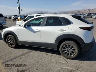 2020 Mazda CX-30 with VIN 3MVDMABL5LM119598, listed as a Copart auction lot 75895764 with 67,639 mi miles and Salvage Title. Bid and sale history available at DreamBid. Image 2.