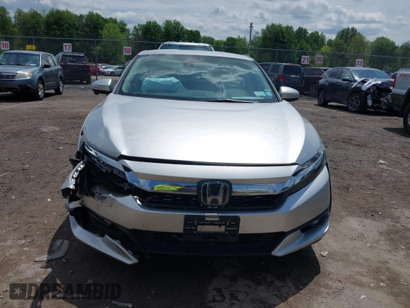 2018 Honda Clarity z VIN JHMZC5F14JC007026, wystawiony jako IAAI lot #42361556 z przebiegiem 74 132 mil mil oraz . Historia ofert i sprzedaży dostępna na DreamBid. Obrazek 12.