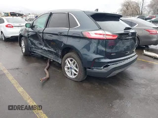 2022 Ford Edge SEL z VIN 2FMPK4J90NBA71360, wystawiony jako IAAI lot #41724316 z przebiegiem 35 309 mil mil oraz . Historia ofert i sprzedaży dostępna na DreamBid. Obrazek 3.