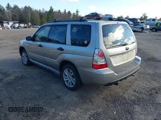 2007 Subaru Forester X with VIN JF1SG63627H747415, listed as a IAAI auction lot 42051221 with 200,763 mi miles. Bid and sale history available at carsss.com. Image 3.