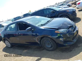 2019 Toyota Corolla L with VIN 2T1BURHE6KC185004, listed as a IAAI auction lot 42105629 with 111,907 mi miles. Bid and sale history available at carsss.com. Image 13.