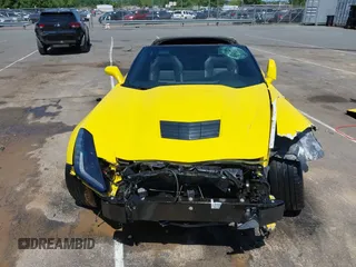 2016 Chevrolet Corvette 1LT z VIN 1G1YB2D77G5111974, wystawiony jako IAAI lot #42134341 z przebiegiem 28 287 mil mil oraz . Historia ofert i sprzedaży dostępna na DreamBid. Obrazek 19.