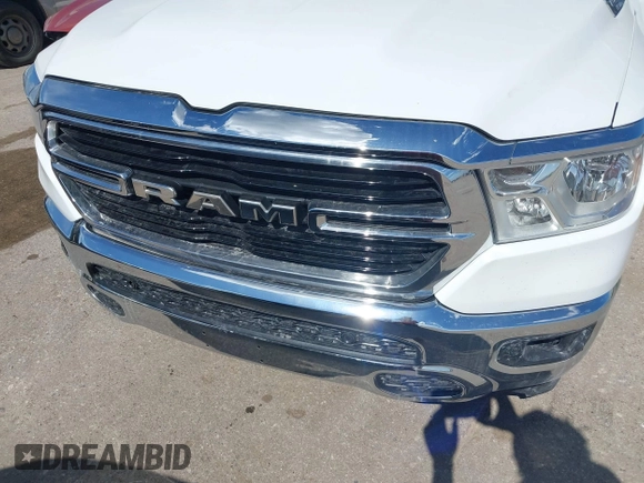 2023 Ram 1500 Big Horn with VIN 1C6RRFFG2PN649047, listed as a IAAI auction lot 42259338 with 14,986 mi miles and . Bid and sale history available at DreamBid. Image 6.