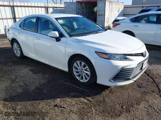 2023 Toyota Camry LE with VIN 4T1C11AK6PU181720, listed as a IAAI auction lot 41423643 with 42,610 mi miles. Bid and sale history available at carsss.com. Image 1.
