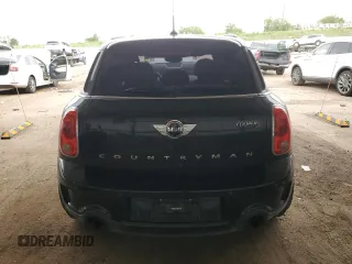 2014 MINI Countryman S with VIN WMWZC5C56EWP38065, listed as a Copart auction lot 59518395 with 91,106 mi miles and Salvage title. Bid and sale history available at DreamBid. Image 6.