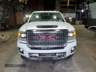 2019 GMC Sierra 3500HD Denali z VIN 1GT42WEY6KF250694, wystawiony jako Copart lot #50035115 z przebiegiem 59 735 mil mil oraz Szkody całkowita. Historia ofert i sprzedaży dostępna na DreamBid. Obrazek 5.