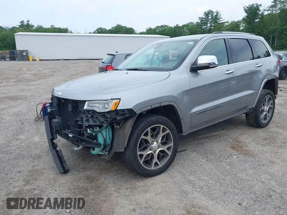 2019 Jeep Grand Cherokee High Altitude with VIN 1C4RJFCG1KC570199, listed as a IAAI auction lot 42464644 with 94,126 mi miles and . Bid and sale history available at DreamBid. Image 2.
