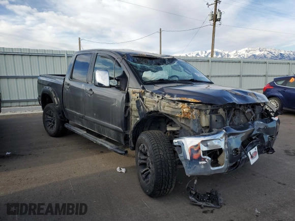 2013 Nissan Titan Pro-4X with VIN 1N6BA0EC2DN305708, listed as a Copart auction lot 45329275 with 68,636 mi miles and Salvage title. Bid and sale history available at DreamBid. Image 4.