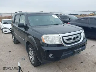 2009 Honda Pilot Touring with VIN 5FNYF388X9B024429, listed as a IAAI auction lot 41924600 with 125,400 mi miles. Bid and sale history available at carsss.com. Image 1.