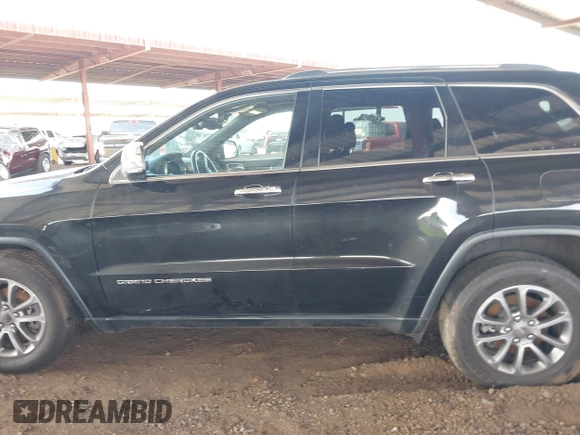 2014 Jeep Grand Cherokee Limited z VIN 1C4RJFBM9EC409093, wystawiony jako IAAI lot #42255242 z przebiegiem 121 059 mil mil oraz . Historia ofert i sprzedaży dostępna na DreamBid. Obrazek 14.