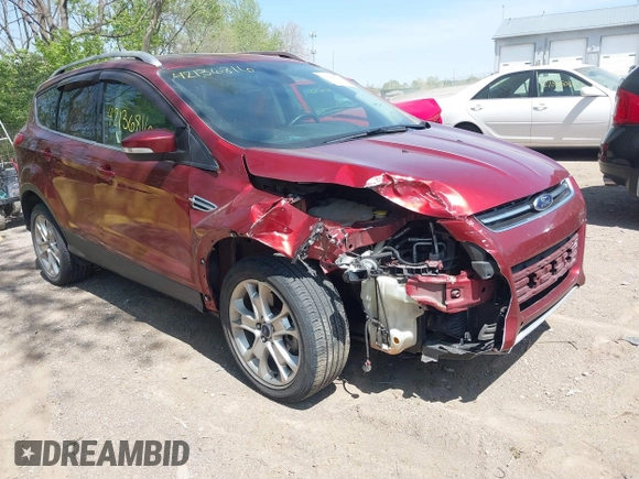 2015 Ford Escape Titanium with VIN 1FMCU0J92FUA38616, listed as a IAAI auction lot 42136816 with 131,941 mi miles and . Bid and sale history available at DreamBid. Image 1.