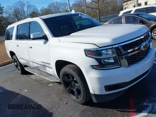 2018 Chevrolet Suburban LT with VIN 1GNSKHKC0JR256720, listed as a IAAI auction lot 41224872 with 121,362 mi miles. Bid and sale history available at carsss.com. Image 1.