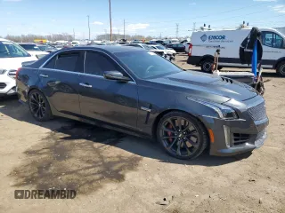 2017 Cadillac CTS-V z VIN 1G6A15S64H0154435, wystawiony jako Copart lot #52790545 z przebiegiem Nie podano mil oraz Tytuł czysty. Historia ofert i sprzedaży dostępna na DreamBid. Obrazek 4.