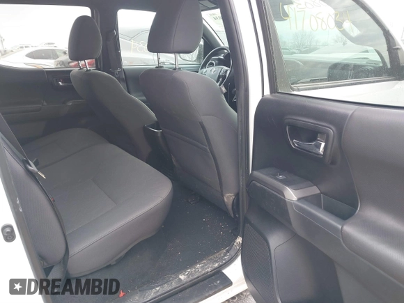 2018 Toyota Tacoma SR5 with VIN 3TMDZ5BN9JM051105, listed as a IAAI auction lot 41708034 with 98,000 mi miles and . Bid and sale history available at DreamBid. Image 8.