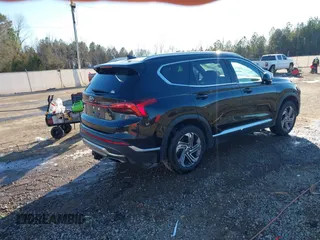 2022 Hyundai Santa Fe SEL with VIN 5NMS24AJXNH375497, listed as a IAAI auction lot 41390349 with 77,067 mi miles and . Bid and sale history available at DreamBid. Image 4.