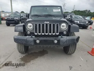 2017 Jeep Wrangler Unlimited Sahara with VIN 1C4BJWEG9HL633296, listed as a Copart auction lot 61387685 with 74,035 mi miles and Salvage title. Bid and sale history available at DreamBid. Image 5.