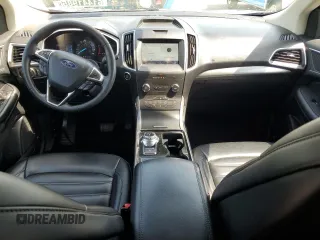 2020 Ford Edge SEL с VIN 2FMPK4J96LBB68740, выставлен на аукционе Copart как лот 61441985 с пробегом 109 389 миль миль и Чистый • Clean title. История ставок и продаж доступна на DreamBid. Изображение 8.
